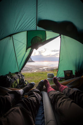 couple watching amazing view from tent