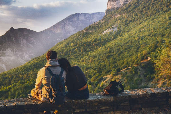 couple having backpacks with them