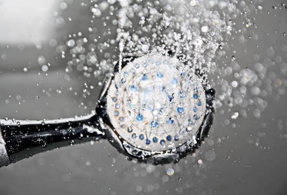 water pouring from portable shower