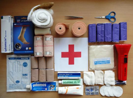 items of first aid kit on a table to build first aid kit