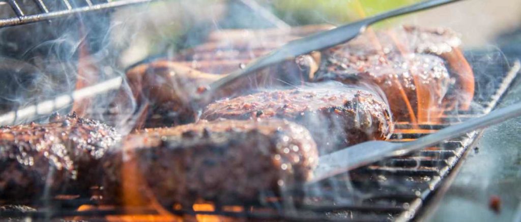 steaks on propane grill