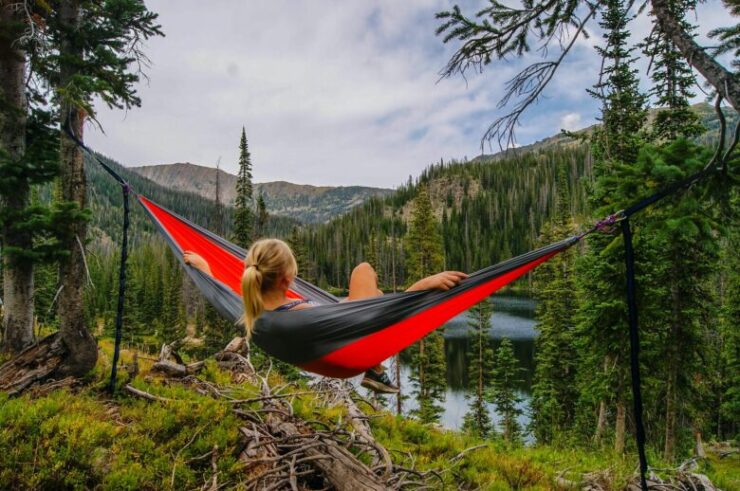 girl enjoys view hammock nature